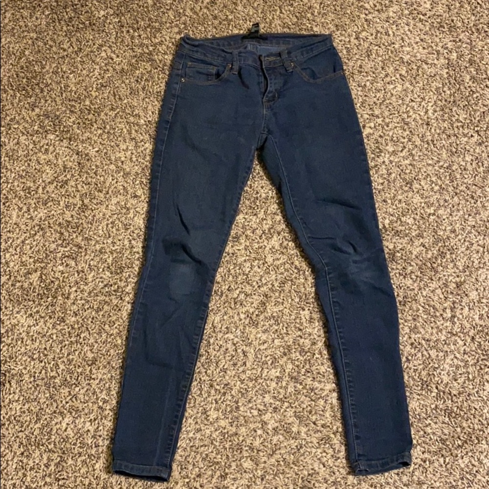 Dark denim skinny jeans.